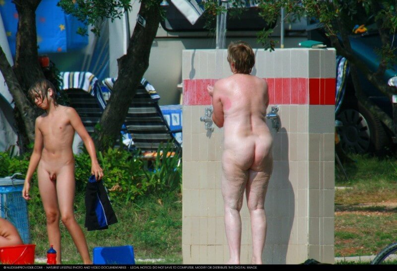 Covered in Towel Nudists-Boardwalk Biking - Nudism is an expression of freedom and individuality