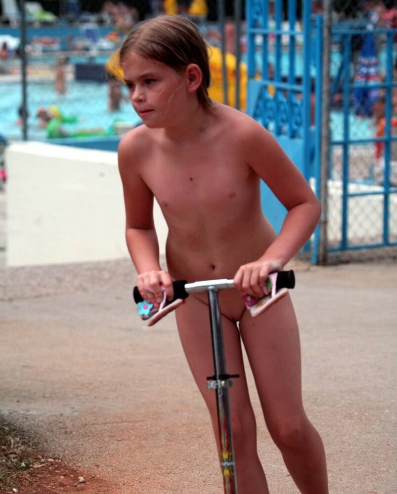 Pool-Side Naturist Scooter pics - Delegation of European Nudists