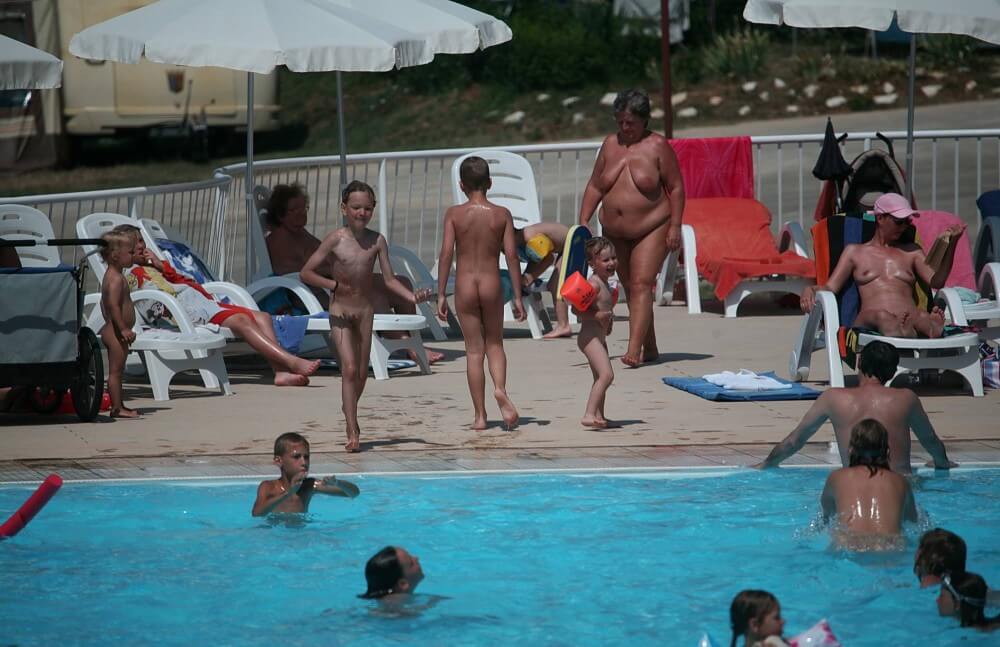 Naturist Afternoon Pool Games pics - Its one thing to see nudists, but another to be a nudist yourself