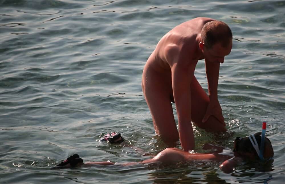 Father Floats His Daughter pics - Nudism is often equated with naturism
