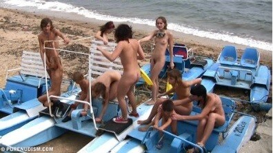 A group of naturists at sea - Growing up on a nude beach